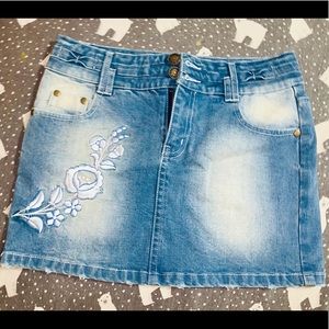 Own Made Mini Skirt with White Flower Design.